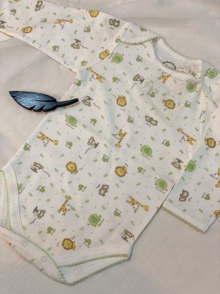 BODY ESTAMPADO PIMA JIRAFAS T.09M