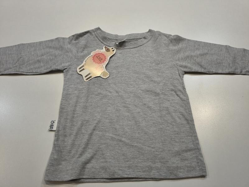 REMERA DE JERSEY LISO CON CUELLO REDONDO 18M