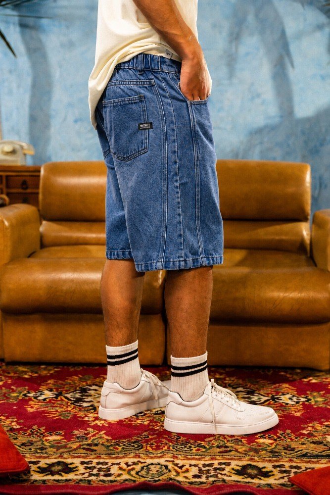 BERMUDA JEAN CON REC. LATERAL RELAXED BAGGY T.18